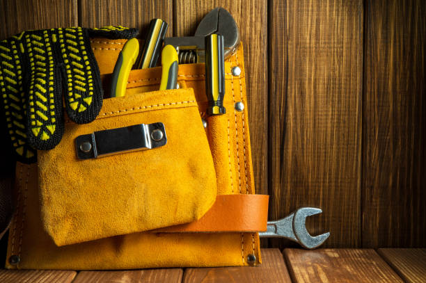 istock Tools and instruments in a leather bag on vintage wooden boards 1482158837