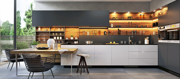 Modern open plan matte black kitchen and dining area