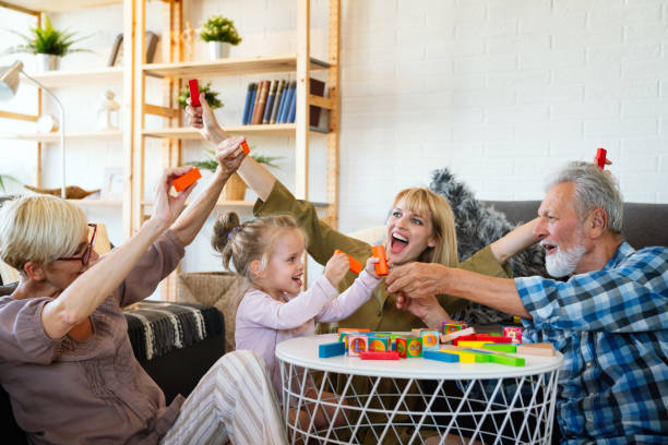 istock Cheerful multi-generation family having fun while spending time together at home. 1482162522