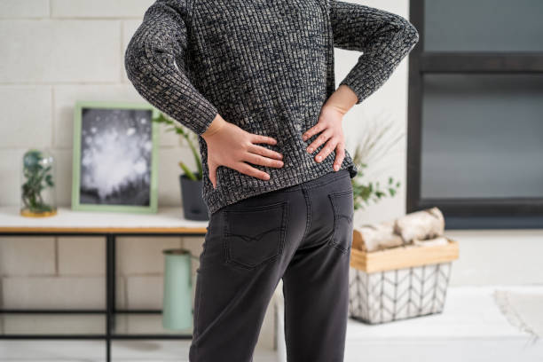 istock Back pain, kidney inflammation, man suffering from backache at home 1482168613