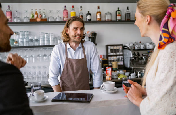 istock Business people having a break at coffee bar 1482168837