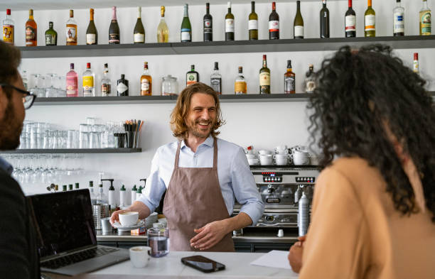 istock Business people having a break at coffee bar 1482168901