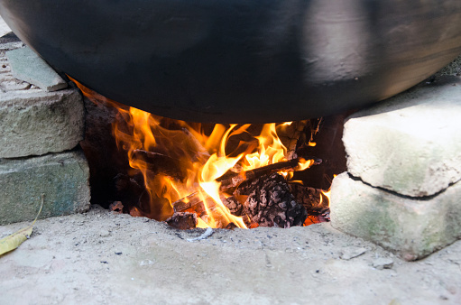 Cooking food in a big bowl for outdoor picnic