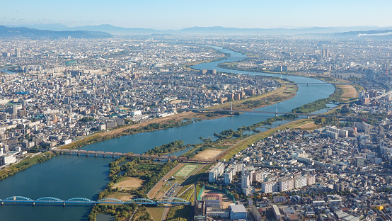 A clear view of Kyoto from above Yodogawa River Park in Osaka City, Osaka Prefecture, on a sunny day in November 2022