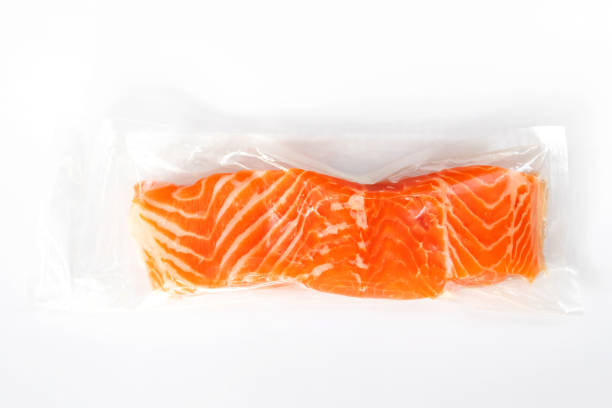 istock Fresh salmon fillet in vacuum package for delicious salmon menu. 1482178561