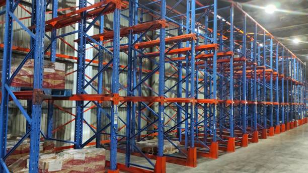 Blue and orange metal rack in warehouse