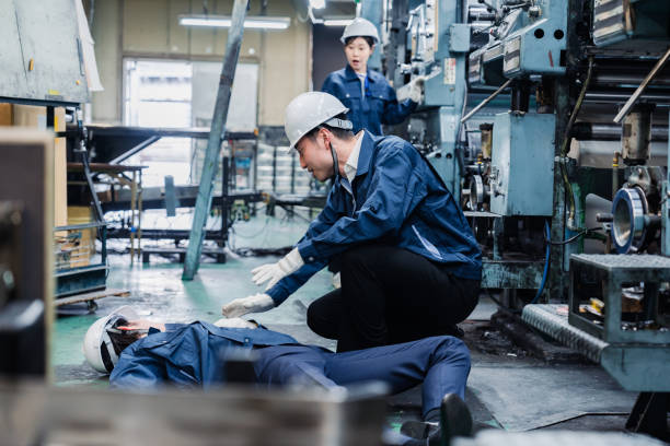 istock Staff dealing with an industrial accident at a factory 1482183893
