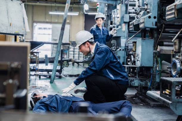 istock Staff dealing with an industrial accident at a factory 1482183907