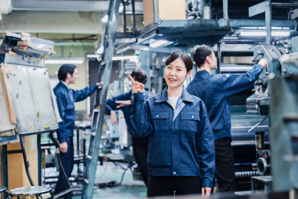 istock Factory staff woman pointing out recommendations 1482185235
