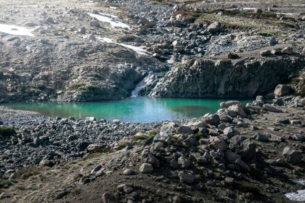 istock Of a tranquil alpine valley with a winding river meandering through it 1482194297