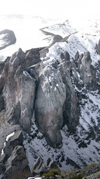 istock A vertical shot of a mountain covered in snow 1482194306