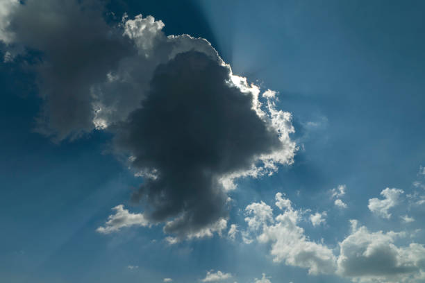 Image of a blue sky with cloud face .