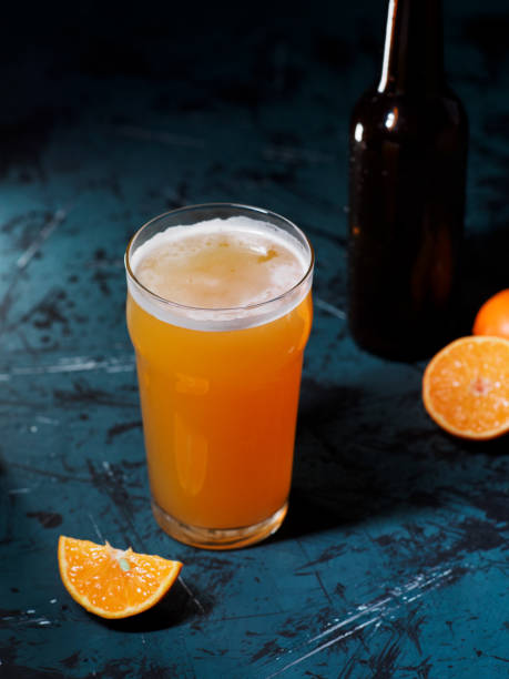istock fruity craft beer with tangerine puree, shandy beer 1482204442