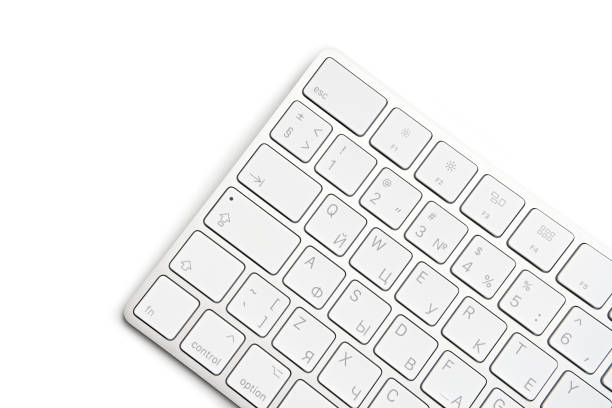 istock Woman Typing On A Keyboard White wireless computer keyboard isolated on white background. Russian / English keyboard layout. 1482207131