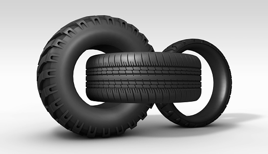 Three interlocking and different size tires rotate around their axes on white background. / You can see the animation movie of this image from my iStock video portfolio. Video number: 1481876401