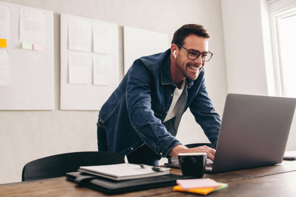 istock Happy businessman connecting with his team online 1482213042