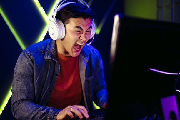 istock Gamer shouting in an intense moment of a pc gaming session 1482213559