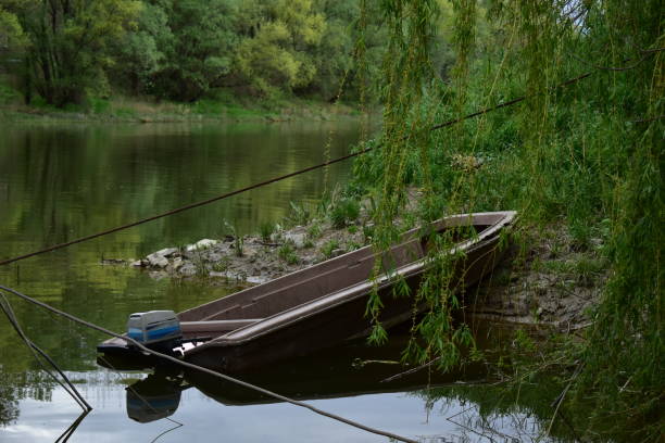 old wooden boat on the river