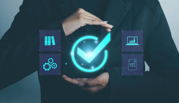 istock Quality assurance control certification standard with Quality management concept.  Businessman hold check mark  service guarantee excellence QC and improvement standardisation for business success. 1482219196