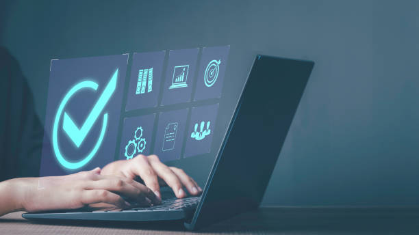 istock Quality assurance control certification standard with Quality management concept. Businessman use laptop show check mark service guarantee QC and improvement standardisation for business success. 1482219229