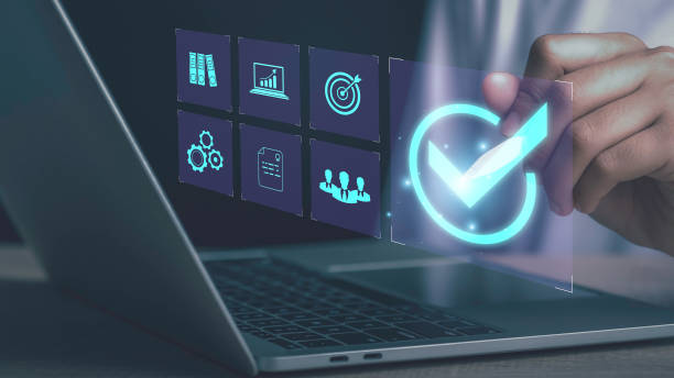 istock Quality assurance control certification standard with Quality management concept. Businessman use laptop show check mark service guarantee QC and improvement standardisation for business success. 1482219236