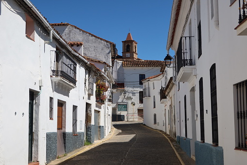 Castano del Robledo, Huelva, Spain, April 2, 2023: Street with white houses in Castano del Robledo, magical town of Andalusia. Huelva, Spain