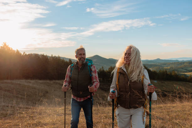 istock Happy senior couple hiking. 1482224164