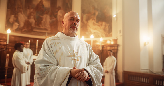 In Grand Old Church Minister Leads The Holy Communion Ceremony, Guiding Christian Congregation Through Eucharist, Sharing Wisdom and Guidance of the Bible, Offers Support And Delivers Hope to People