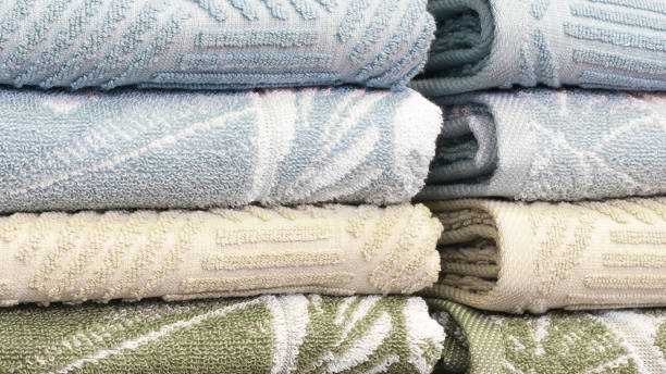 istock Colorful folded towels stack closeup picture, hotel service concept background 1482229824