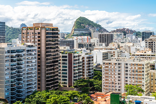 This photo showcases the awe-inspiring skyline of Rio de Janeiro, Brazil. The cityscape is a magnificent display of architectural and natural wonders. The photo captures the bustling metropolis with its vibrant streets, colorful buildings, and modern infrastructure, making it an ideal choice for travel brochures, websites, or any project that aims to highlight the beauty and wonder of this incredible city.