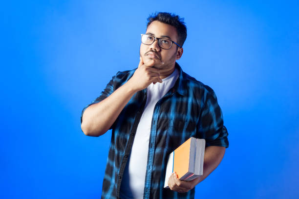 istock indian adult student thinking with confusion facial expression 1482230416