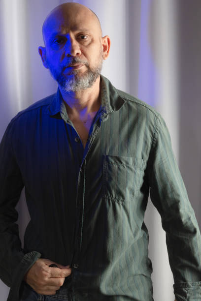 istock Standing, slim, serious and confident man. Studio portrait. 1482230929