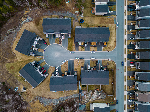 Aerial drone view of a suburban landscape in early Spring.