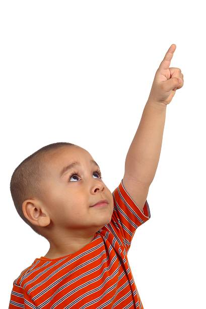 istock Boy looking up and pointing, 4 years old 148223543