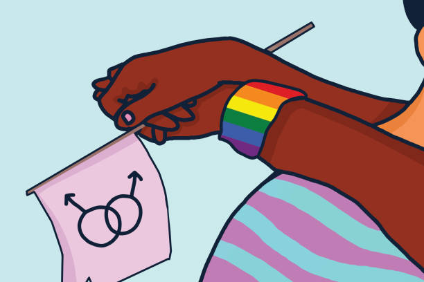 Free Stock Photo of Young gay man holding a rainbow pride flag ...