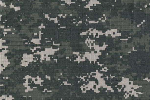 istock texture texture of camouflage rip stop fabric. textured background closeup 1482243245