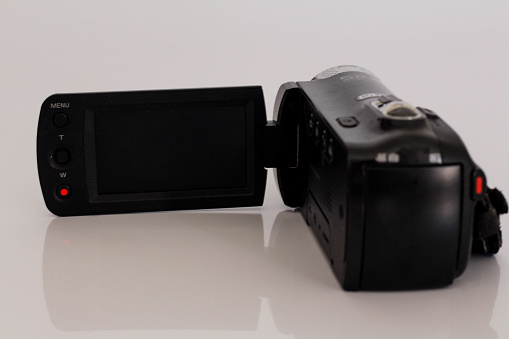 Handycam HD black, in open position, great for montages, with infinite background