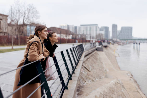 istock Two girls relaxing and looking at a beautiful view 1482246518