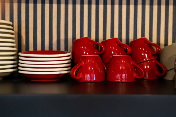 istock Bunch of clean tableware on the countertop in a cafe 1482248639