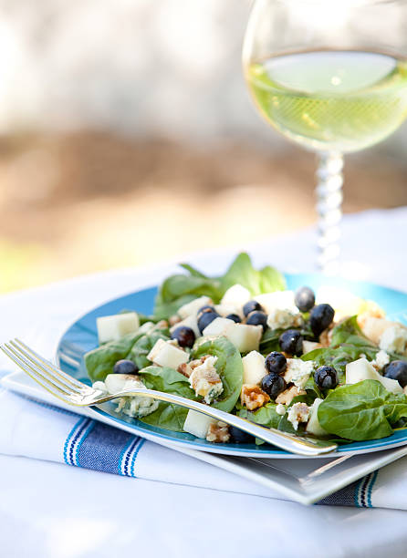 Spinach And Gorgonzola Cheese Salad With Blueberries,Pears stock photo