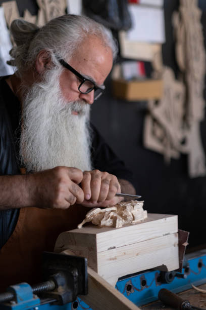 istock Senior male carpenter working 1482250515
