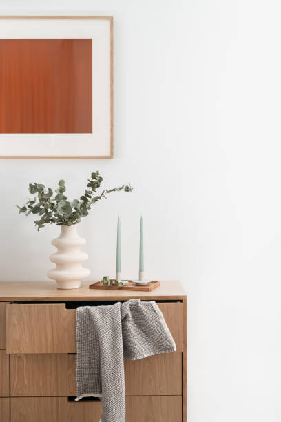 istock ceramic vase and candles on shelf in stylish bedroom 1482251375