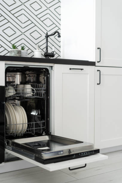 istock open dishwasher with clean plates, cups and cutlery 1482251452