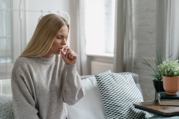 istock sick woman coughing and has flu infection 1482251633