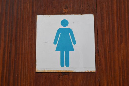 a signs or information on the door in the ladies' restroom.