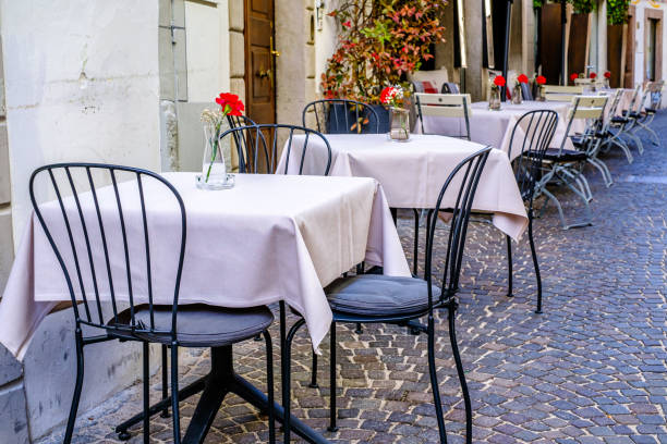 istock sidewalk restaurant in italy 1482254764