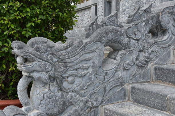 Stone Dragon Railing in Profile at Con Dao Temple stock photo