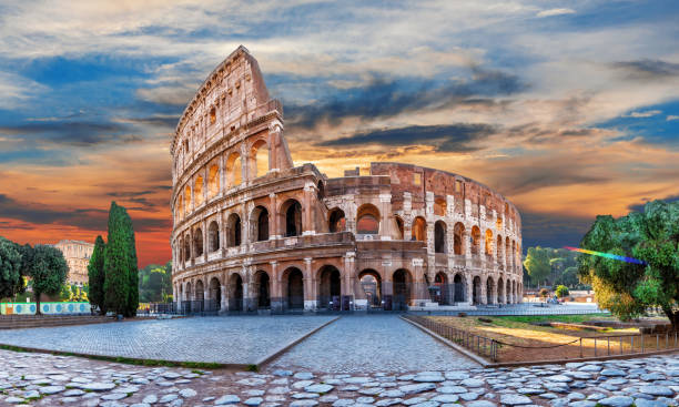 istock Roman Coliseum at sunset, summer view under the clouds, Italy 1482256450