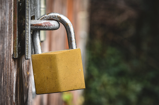 Padlock on a river weir