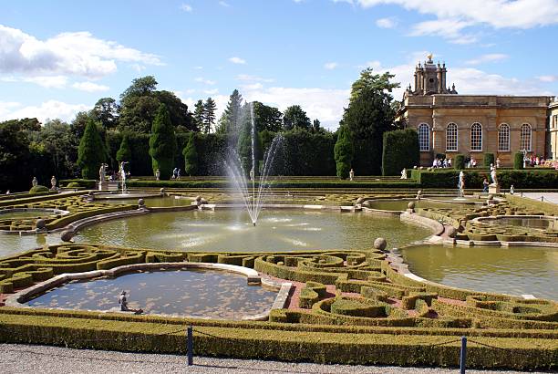 istock Fountain with maze ponds hedges in garden 148225930